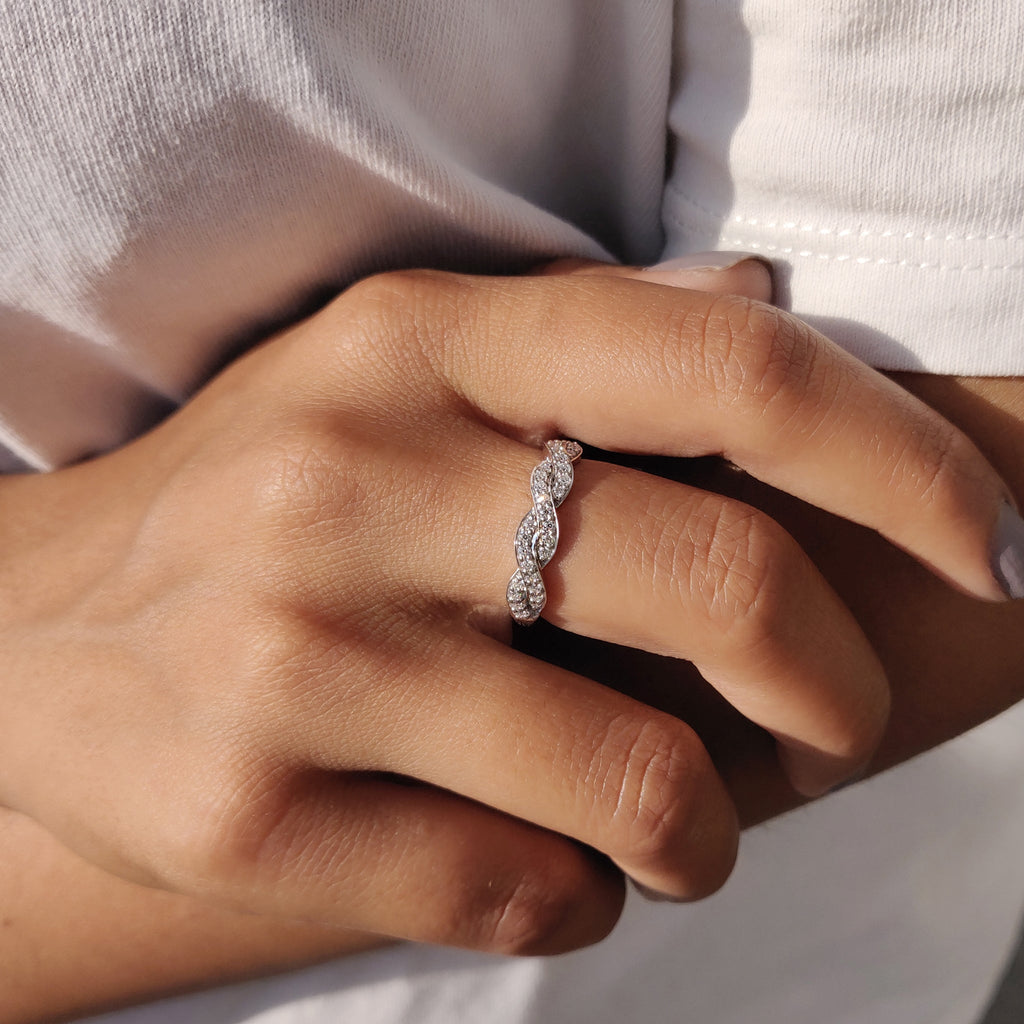 Twisted Eternity Band In Round Cut Moissanite