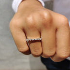 Shared Prong Eternity Band With Round And Baguette Moissanite