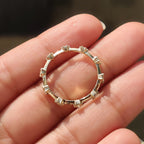 round cut wedding band In Distance Pave Setting
