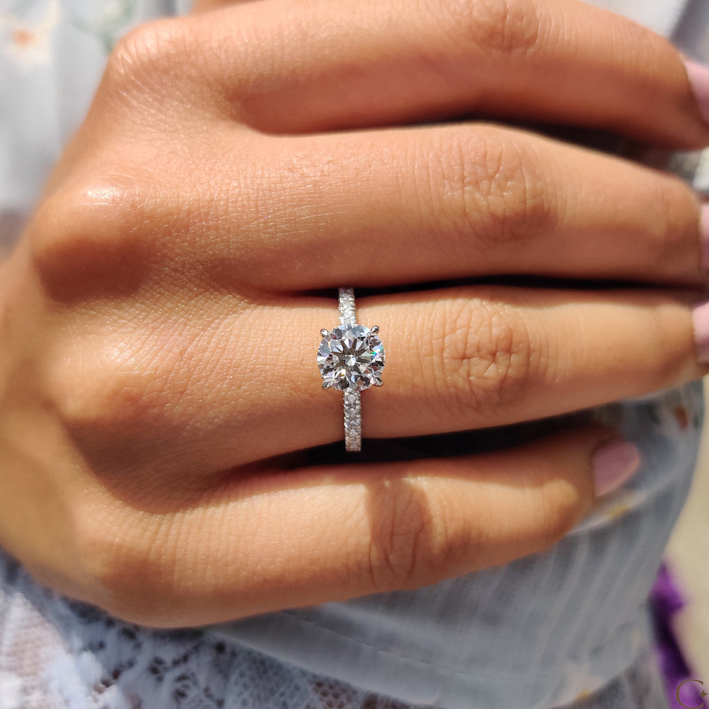 Round Cut Diamond Engagement Ring with Hidden Halo Design