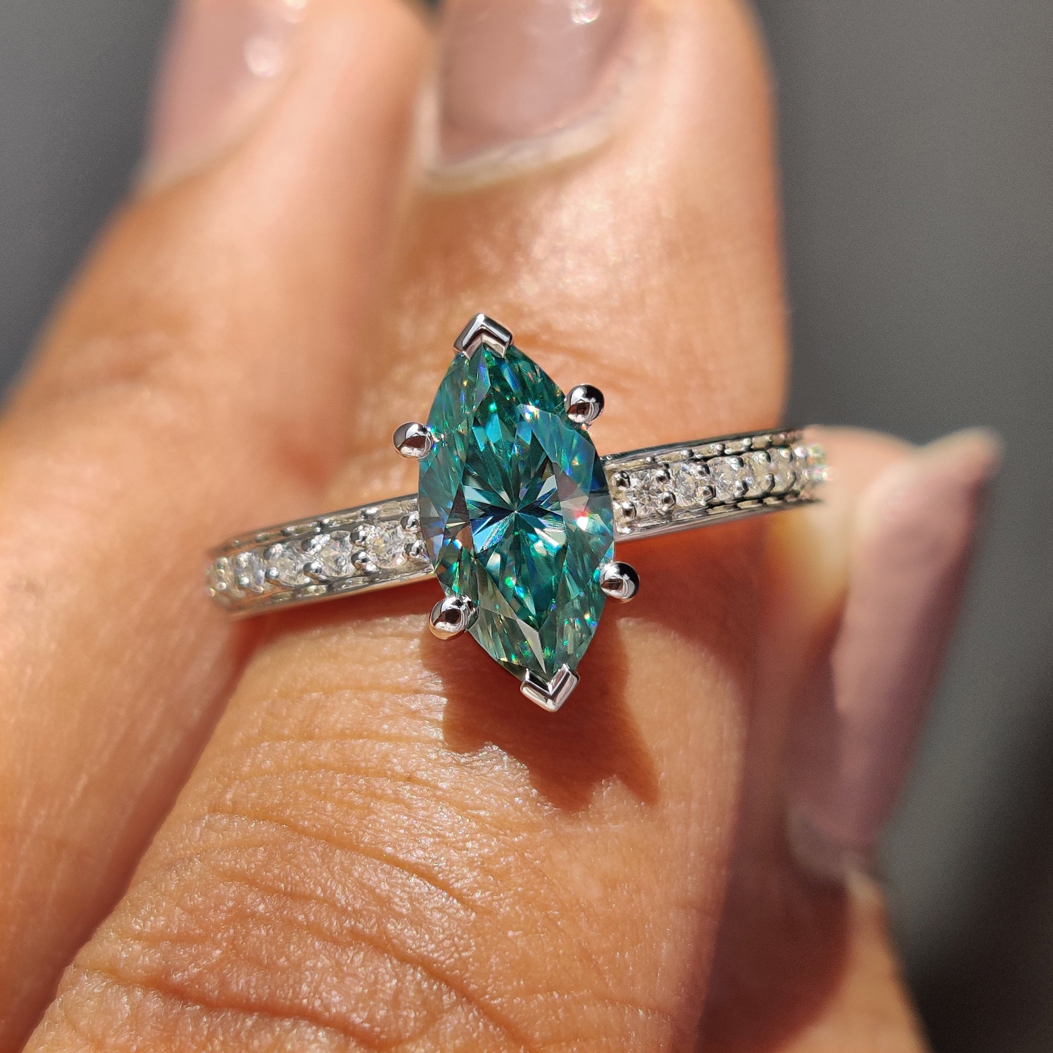 Cyan Blue Marquise Moissanite Ring With Pave Band