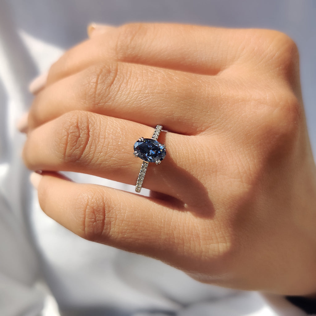 Royal Dark Blue Oval Cut Cathedral Setting Ring