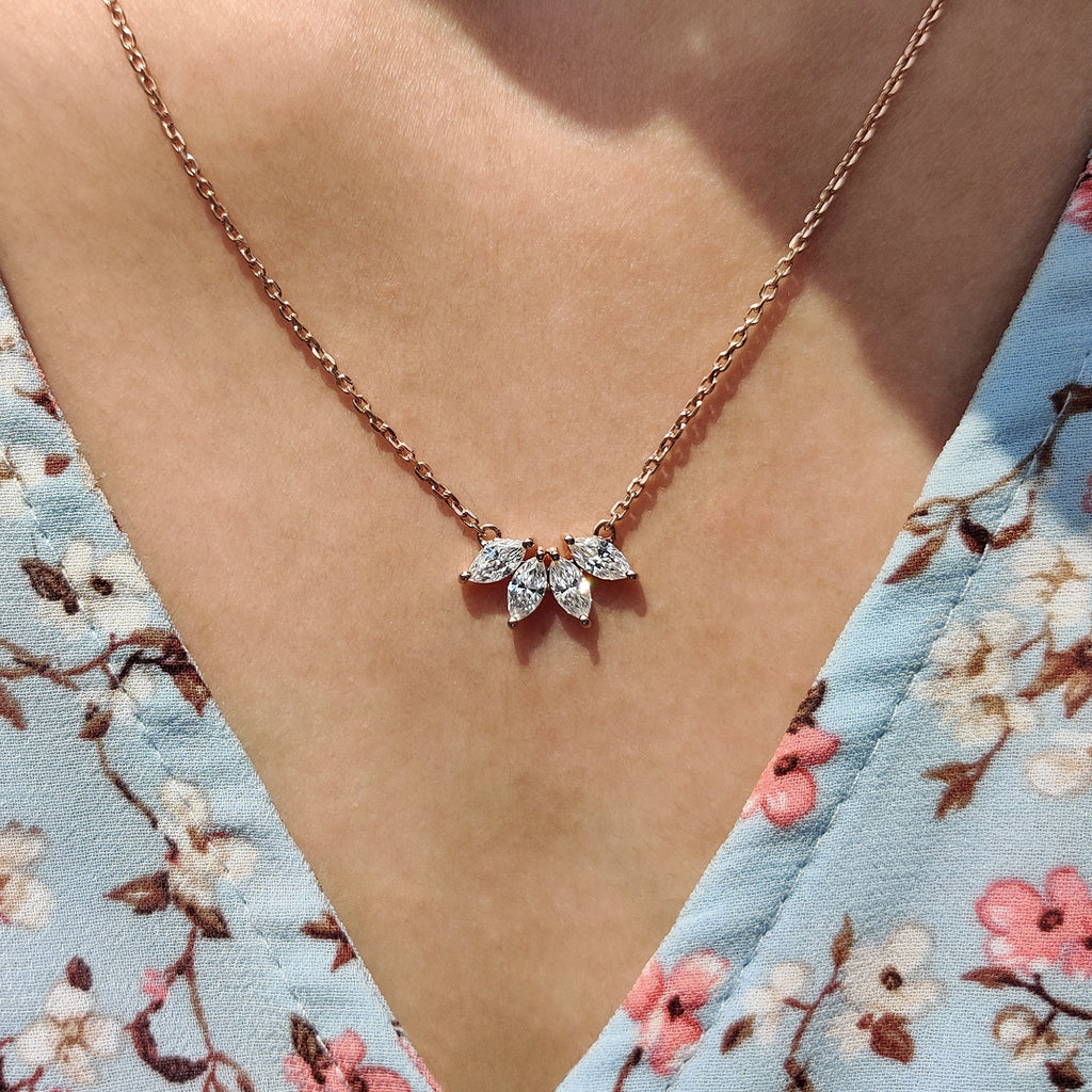 Arc Marquise Moissanite Pendant In Four Stone Design