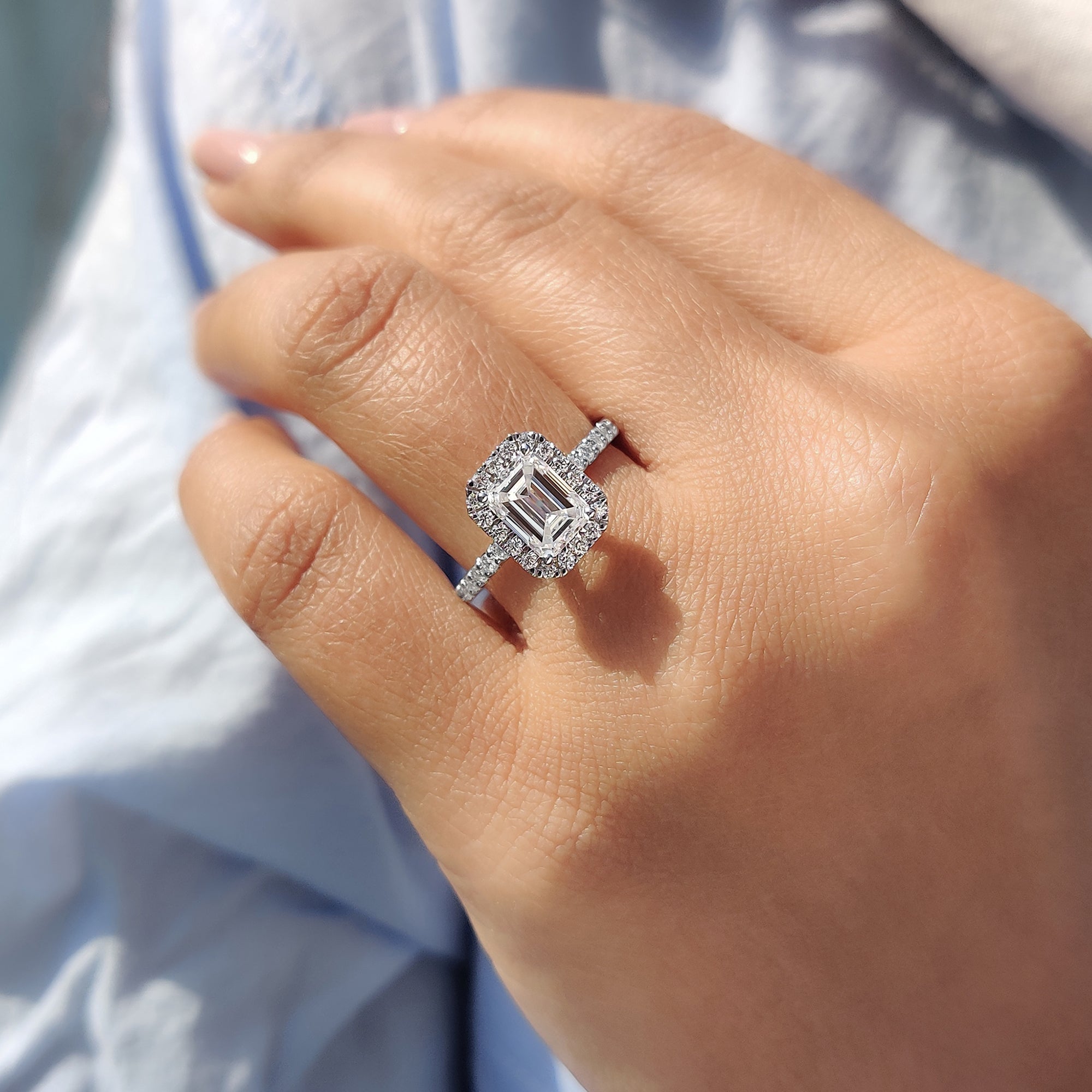 Emerald cut halo ring In Round Cut Pave Band