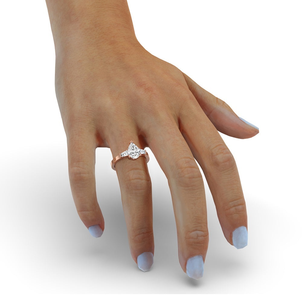 Pear and Baguette Cut Three Stone Engagement Ring
