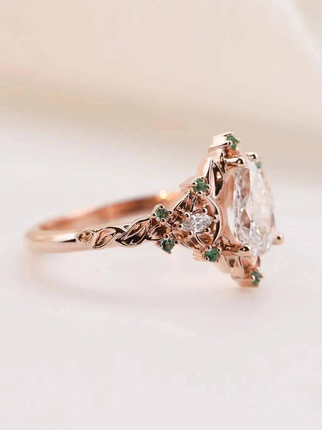 2 caret pear center lab grown with Briar moon three stone rings Secondary image