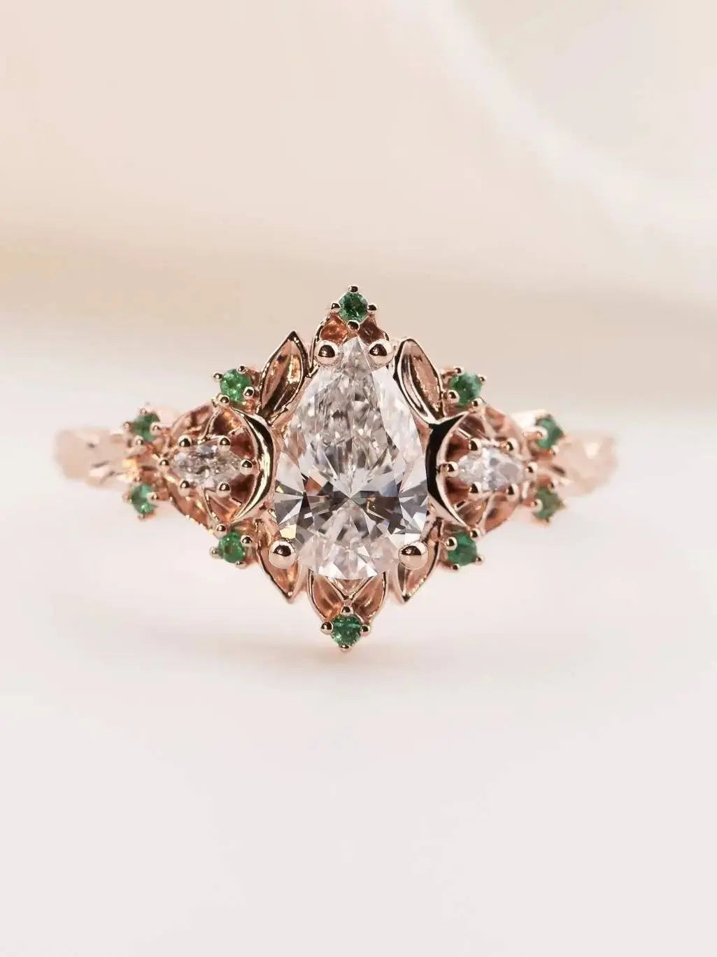 2 caret pear center lab grown with Briar moon three stone rings DisneyValley Main image