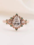 2 caret pear center lab grown with Briar moon three stone rings DisneyValley