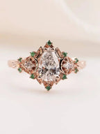 2 caret pear center lab grown with Briar moon three stone rings DisneyValley