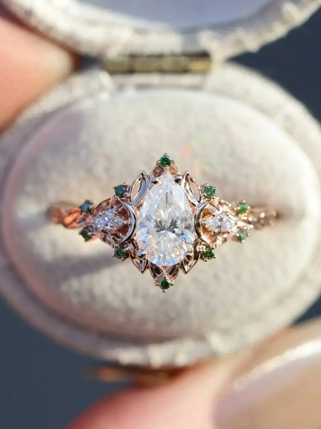 2 caret pear center lab grown with Briar moon three stone rings DisneyValley
