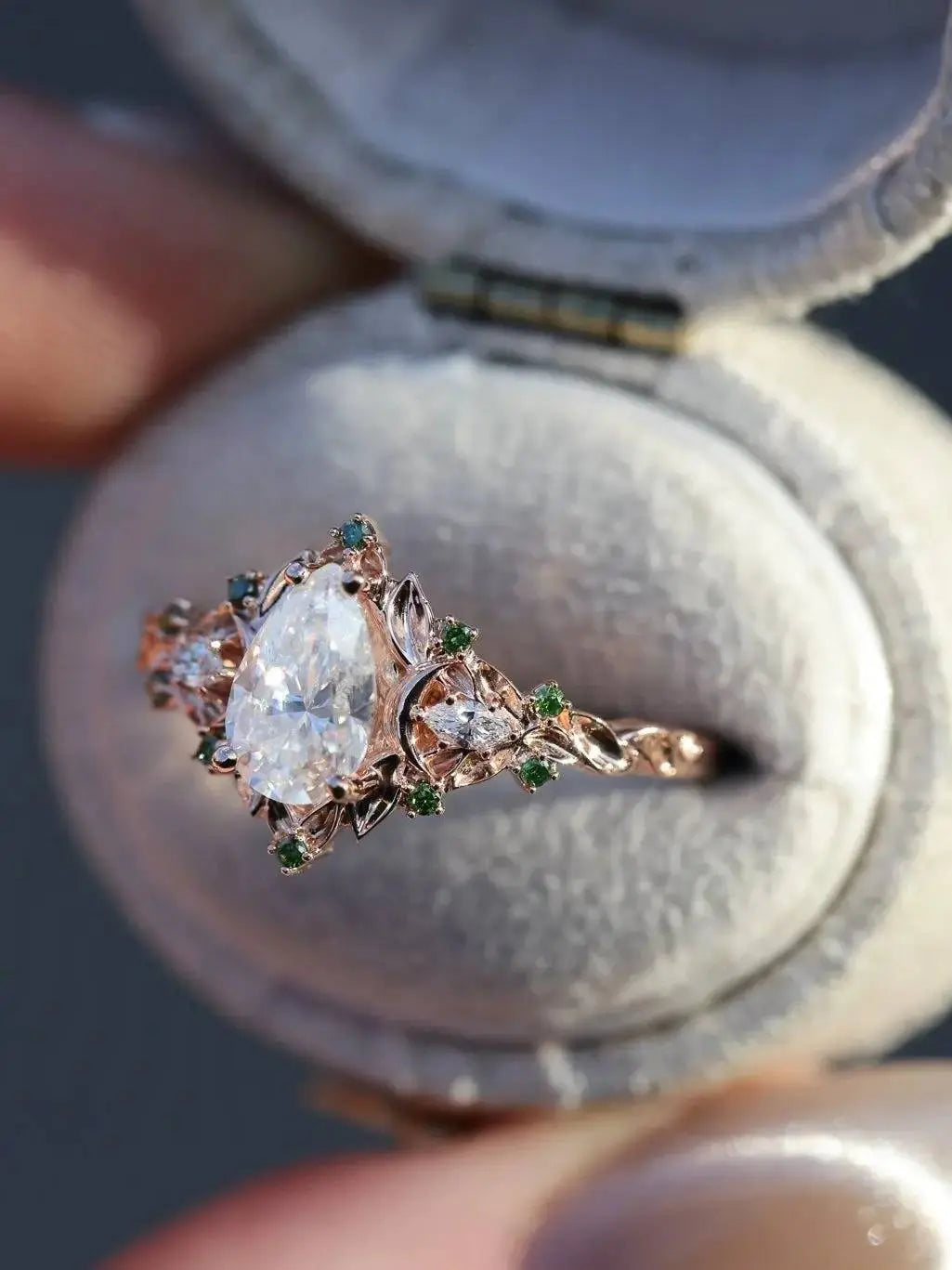 2 caret pear center lab grown with Briar moon three stone rings DisneyValley