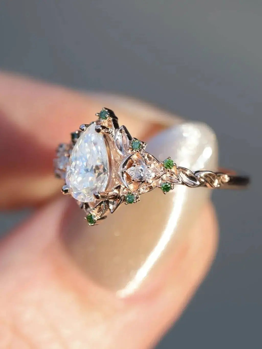 2 caret pear center lab grown with Briar moon three stone rings DisneyValley