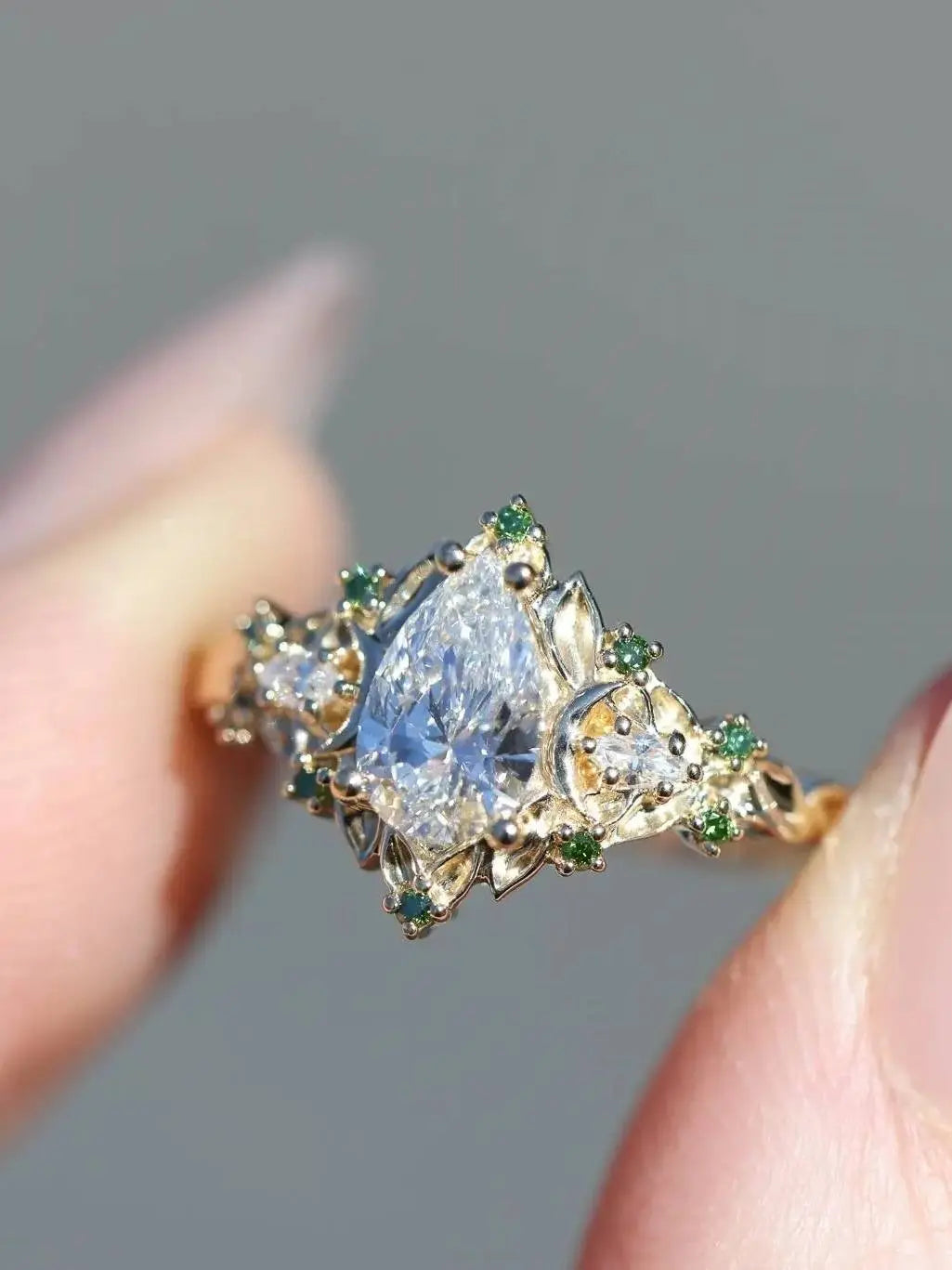 2 caret pear center lab grown with Briar moon three stone rings DisneyValley