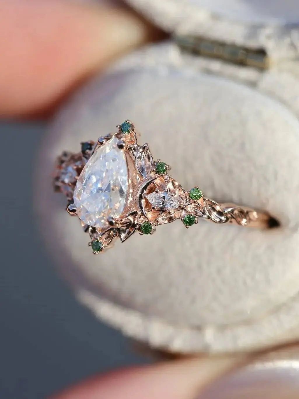 2 caret pear center lab grown with Briar moon three stone rings DisneyValley