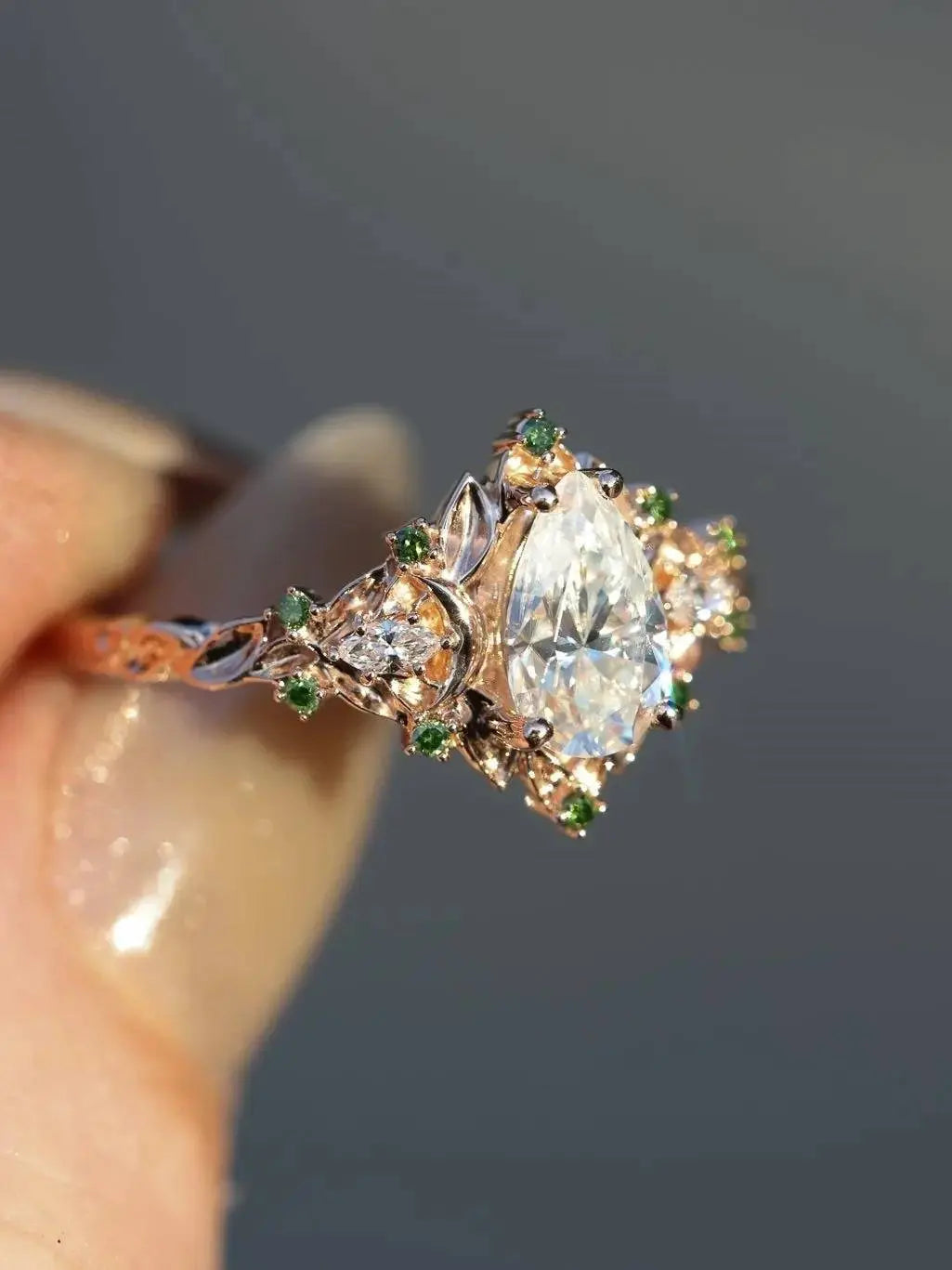 2 caret pear center lab grown with Briar moon three stone rings DisneyValley