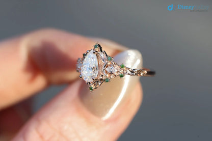 2 caret pear center lab grown with Briar moon three stone rings DisneyValley