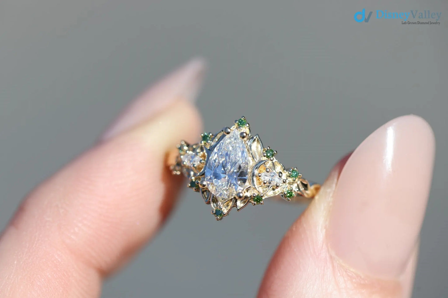 2 caret pear center lab grown with Briar moon three stone rings DisneyValley