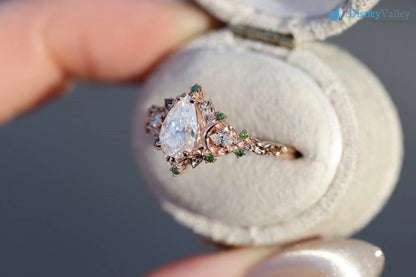 2 caret pear center lab grown with Briar moon three stone rings DisneyValley