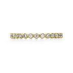 0.38 TCW Round Cut Bezel Style Moissanite Wedding Band