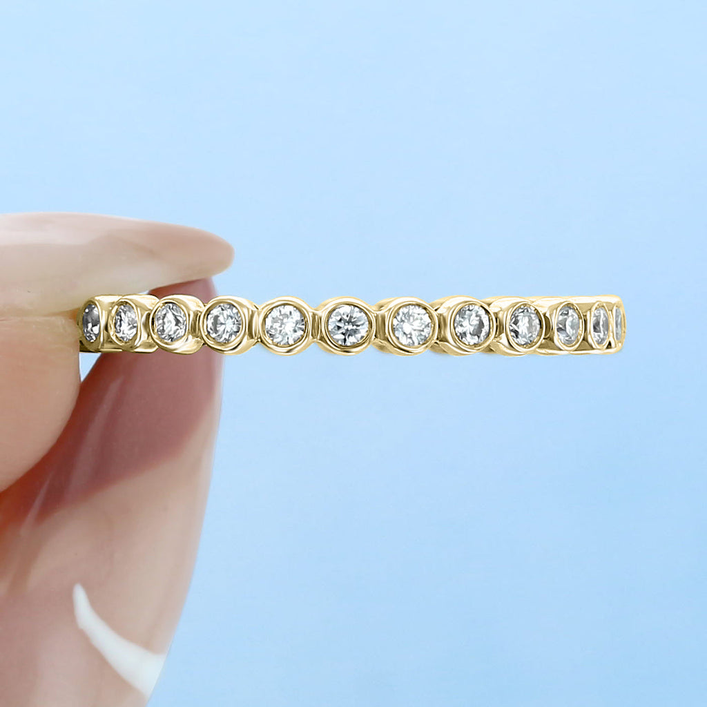 0.38 TCW Round Cut Bezel Style Moissanite Wedding Band