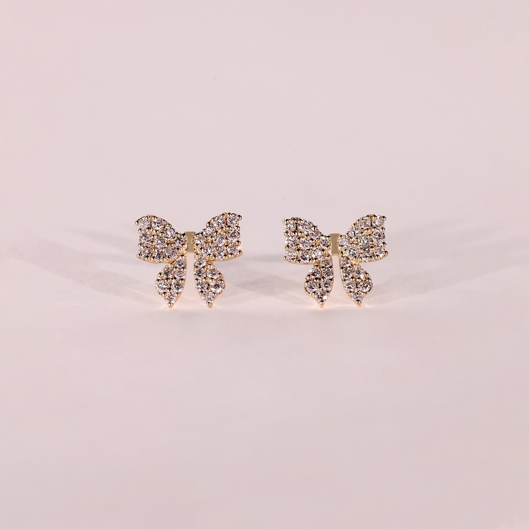 Round Cut Diamond Gold Bow Earrings