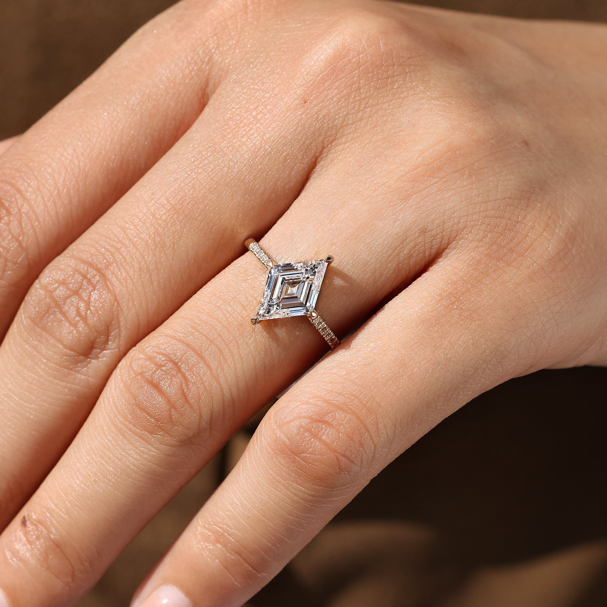 Lozenge Cut Diamond Ring in Secure Compass Prong Setting