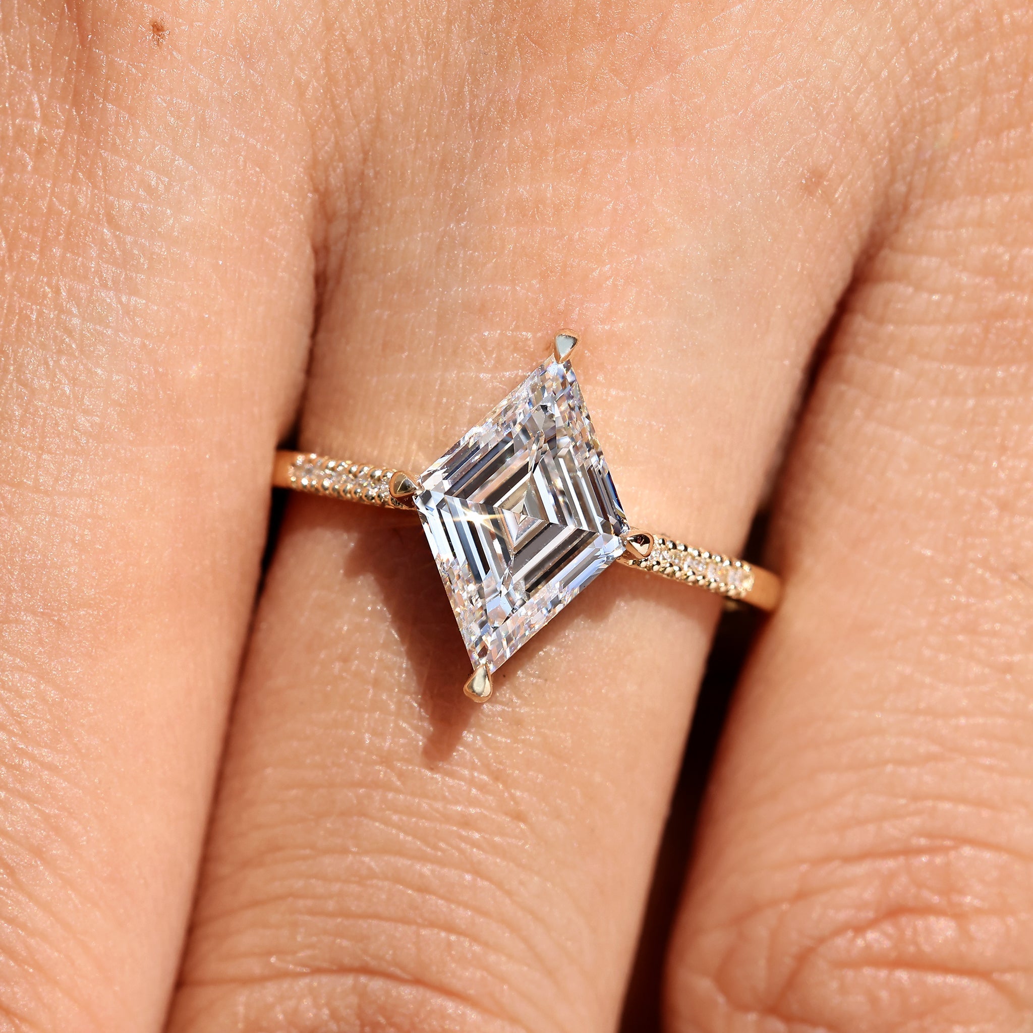 Lozenge Cut Diamond Ring in Secure Compass Prong Setting
