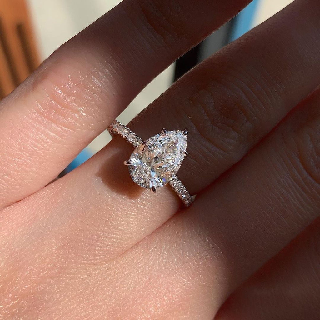 0.94 CT Pear Cut Moissanite Pave Style Engagement Ring