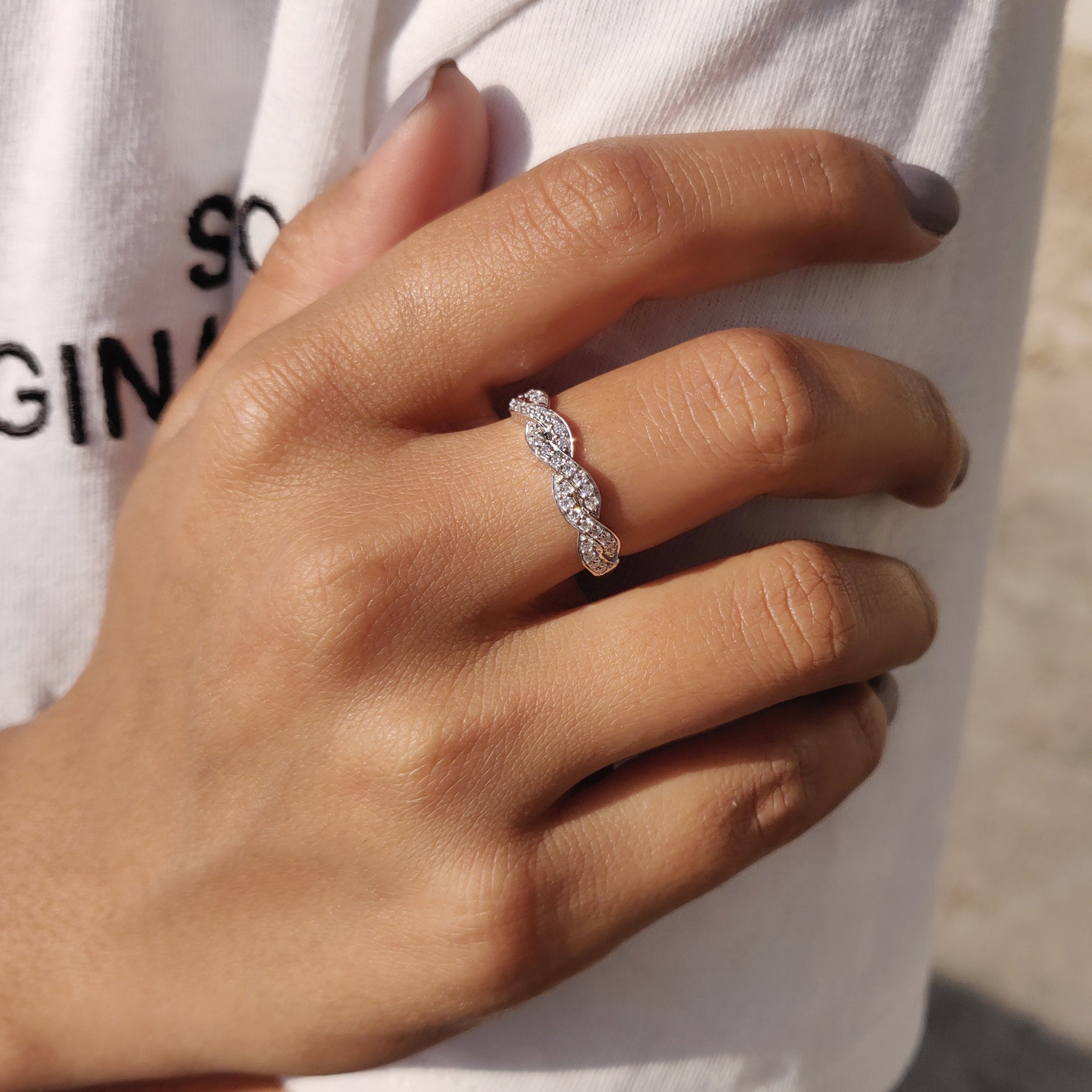 Twisted Eternity Band In Round Cut Moissanite