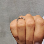 Shared Prong Eternity Band With Round And Baguette Moissanite