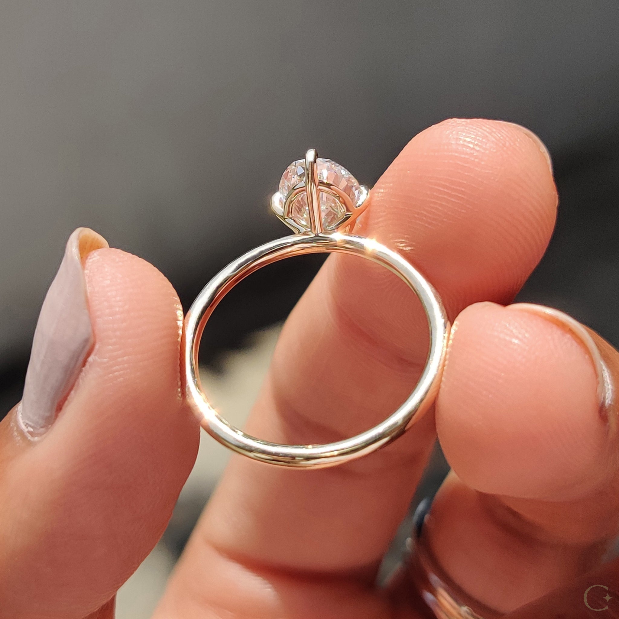 Oval Solitaire Diamond Ring With Compass Prong