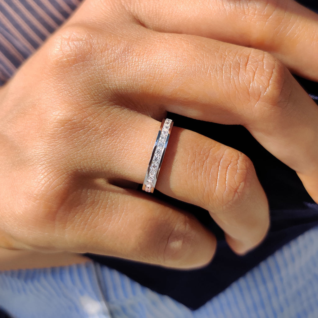 Round Moissanite Channel Set Wedding Band