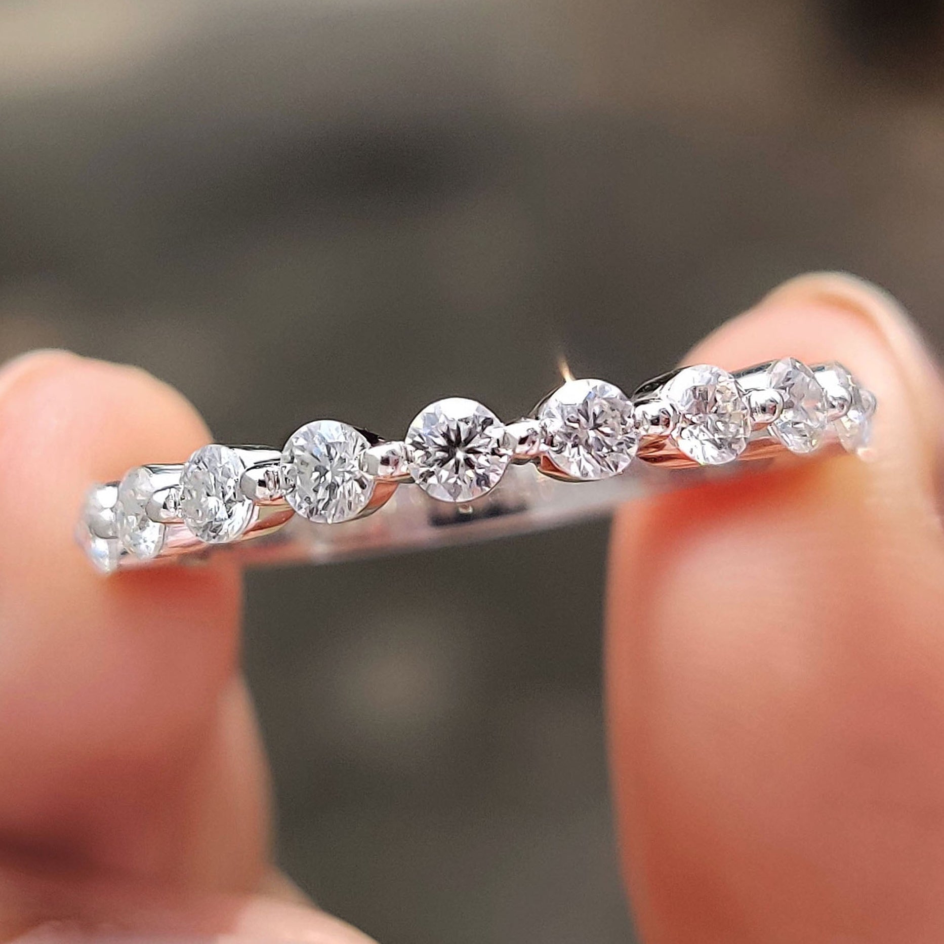 Round Stone Wedding Band In Half Eternity Style Imagen principal del producto