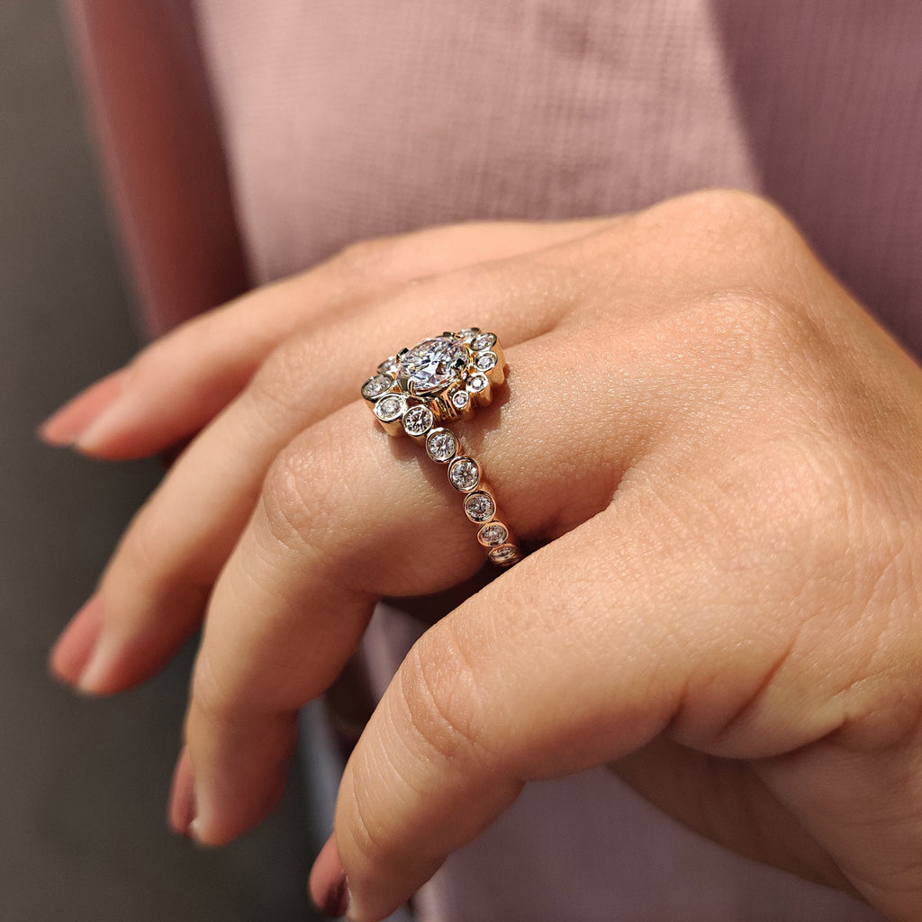 Round Halo Engagement Ring In Bezel Setting Style