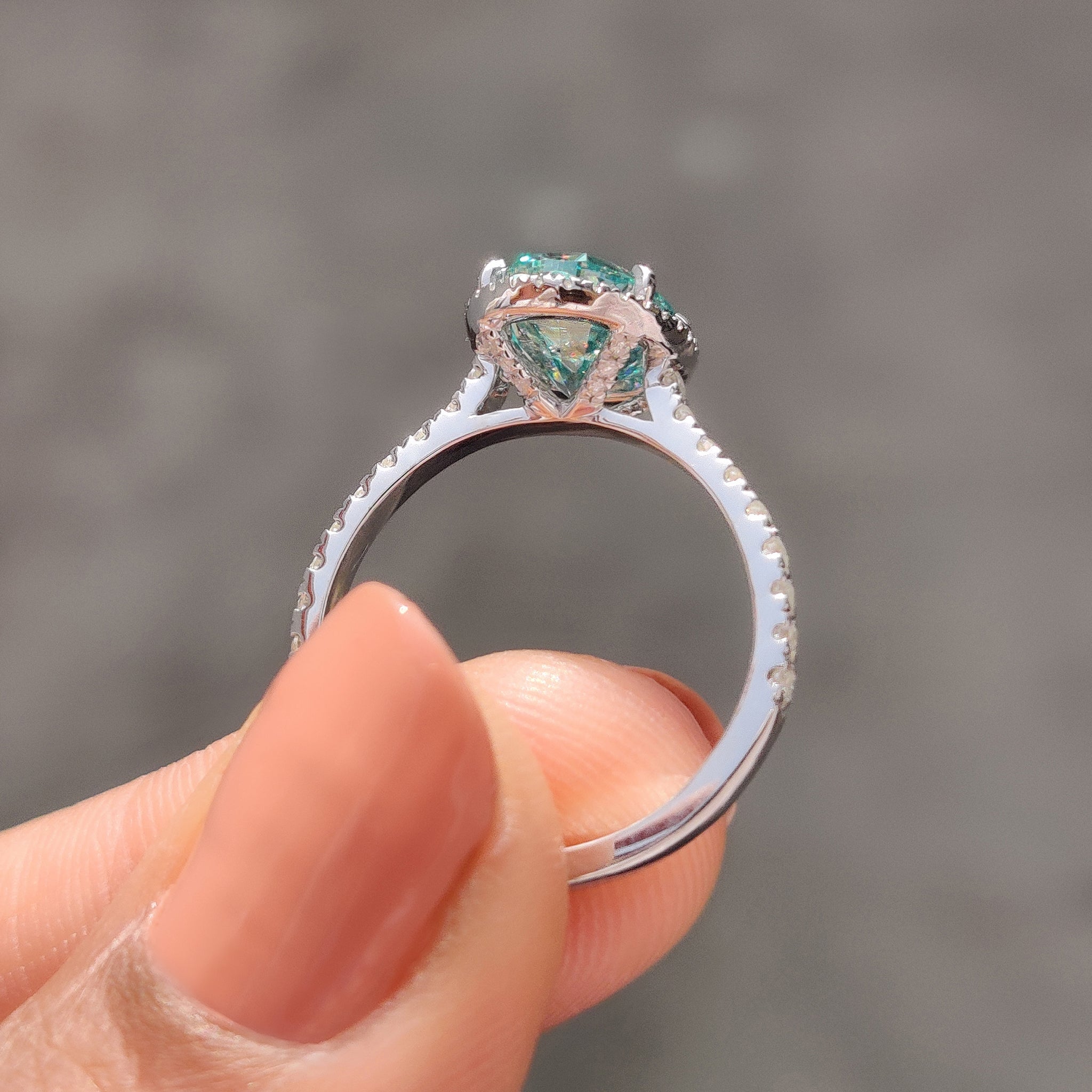 Oval Halo Engagement Ring With Cyan Blue Stone
