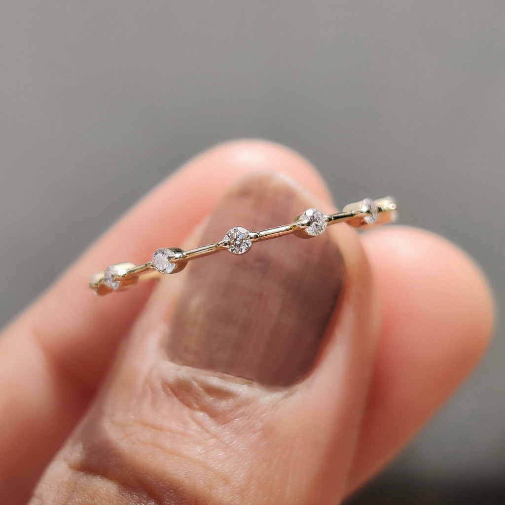 Round Diamond Eternity Band in Distance Pave Style