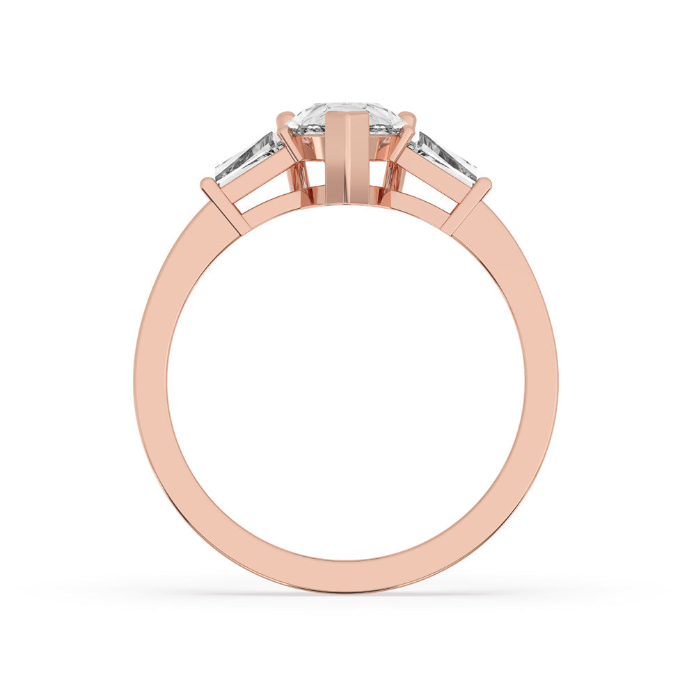 Pear and Baguette Cut Three Stone Engagement Ring