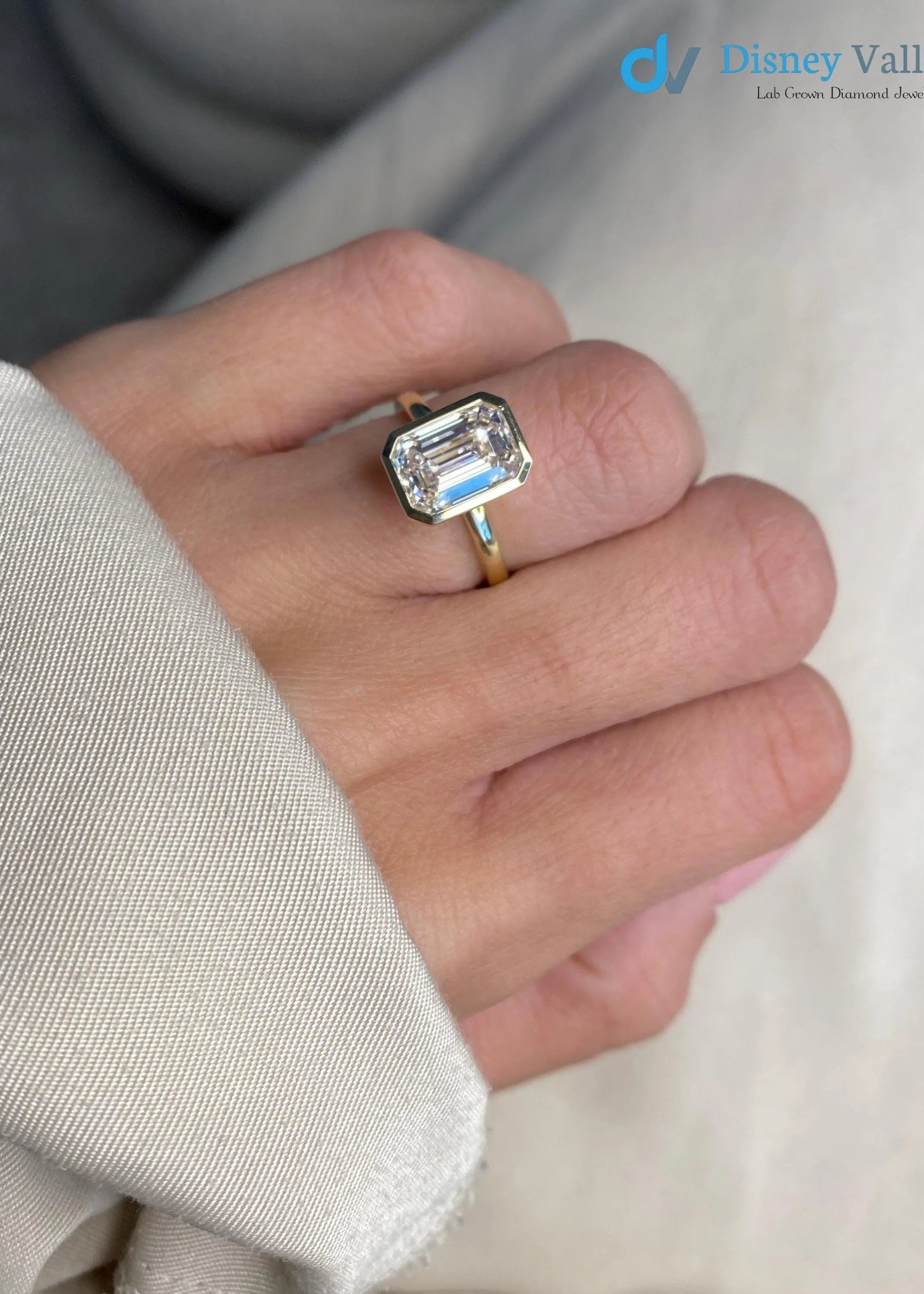 3 Carat D-VVS2 Emerald Cut Lab Grown Diamond Bezel Set Solitaire Engagement Ring - DisneyValley Main image