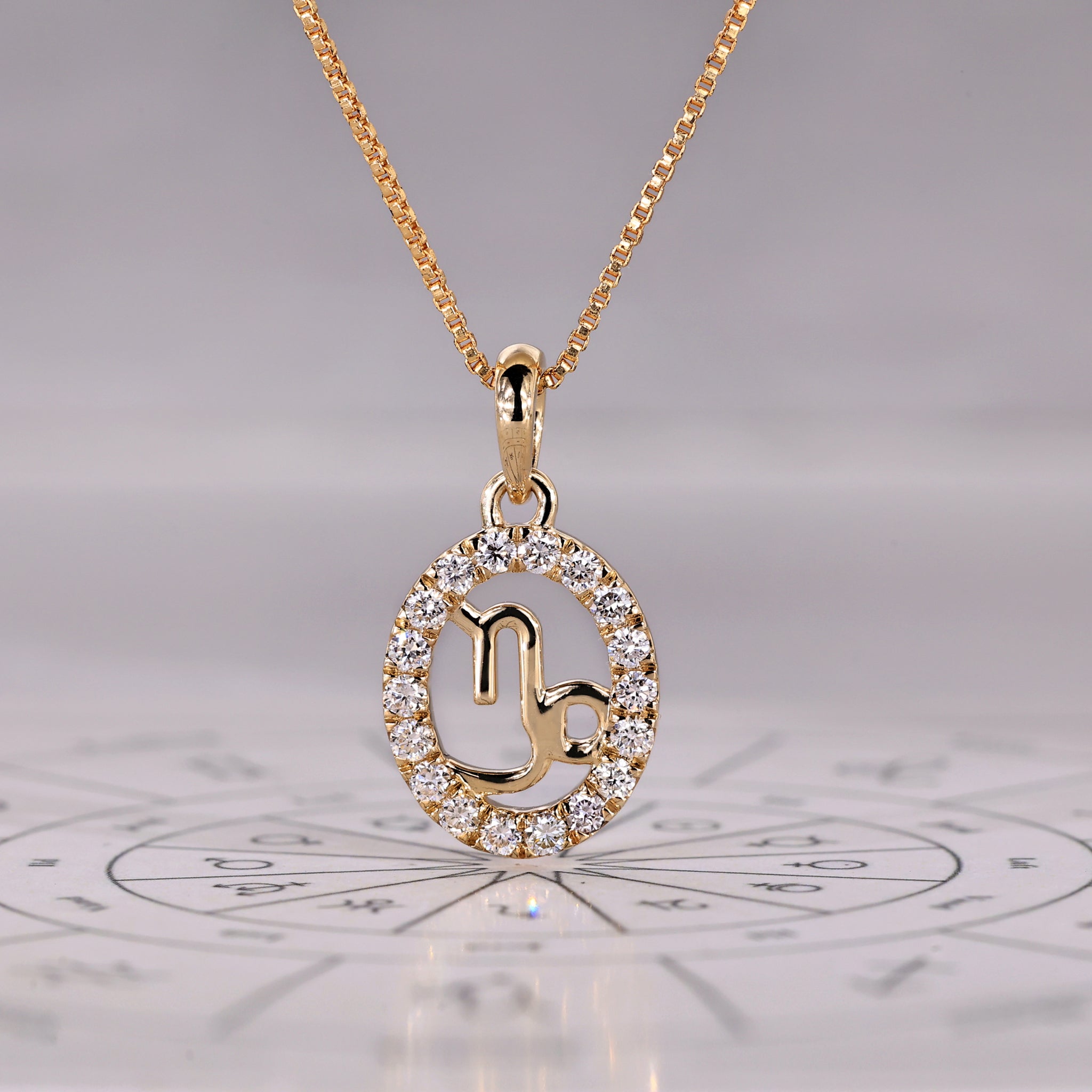 Yellow Gold Capricorn Pendant In Halo Style