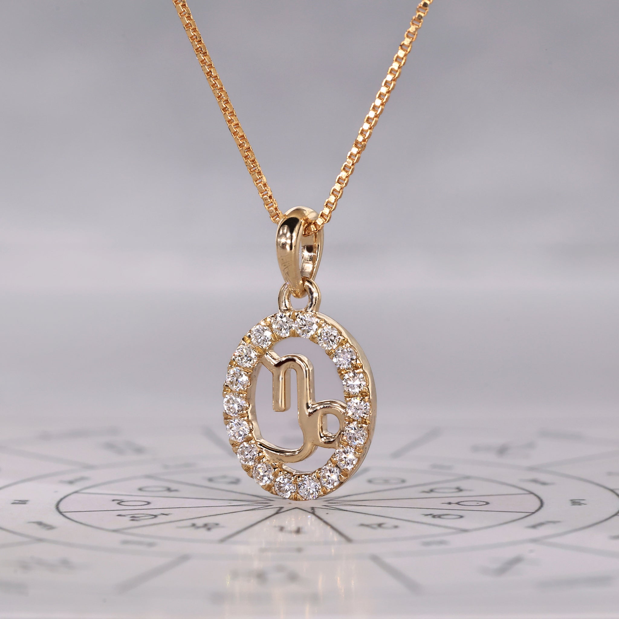 Yellow Gold Capricorn Pendant In Halo Style