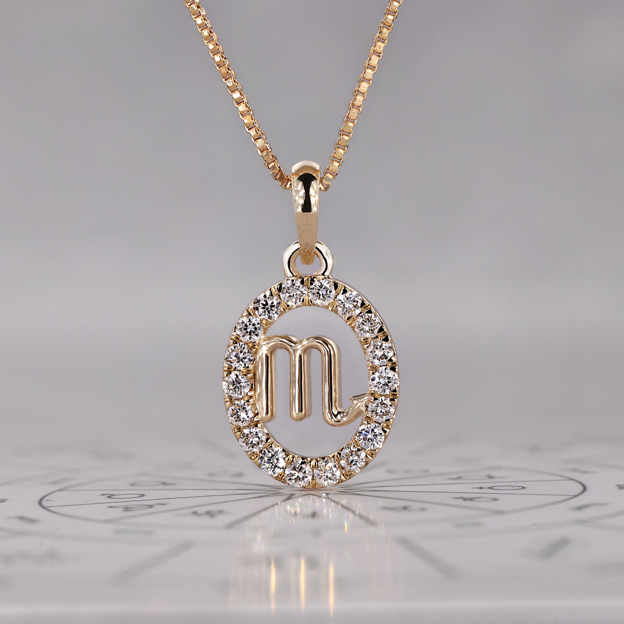 Yellow Gold Scorpio Pendant In Halo Design