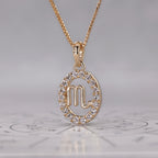 Yellow Gold Scorpio Pendant In Halo Design