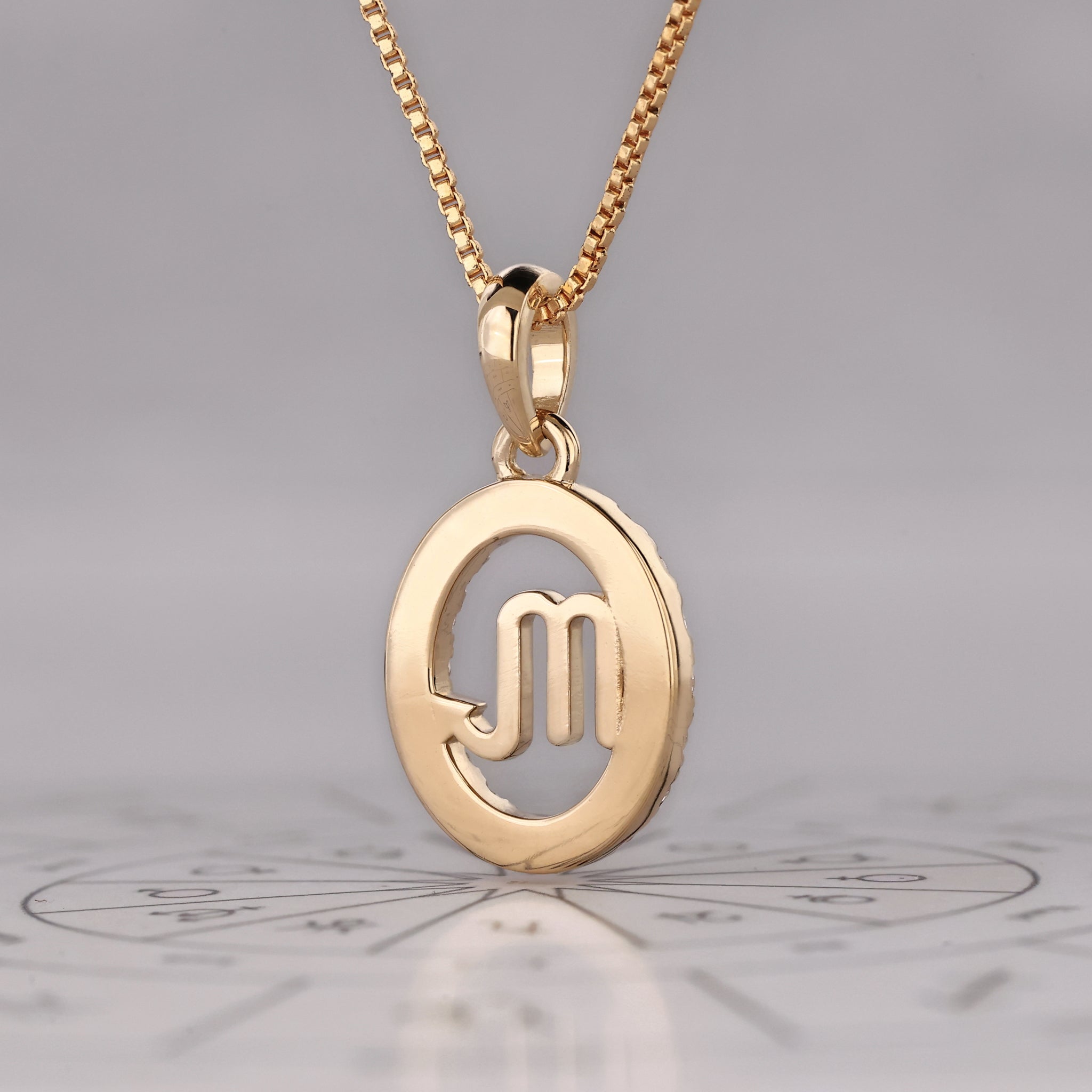 Yellow Gold Scorpio Pendant In Halo Design