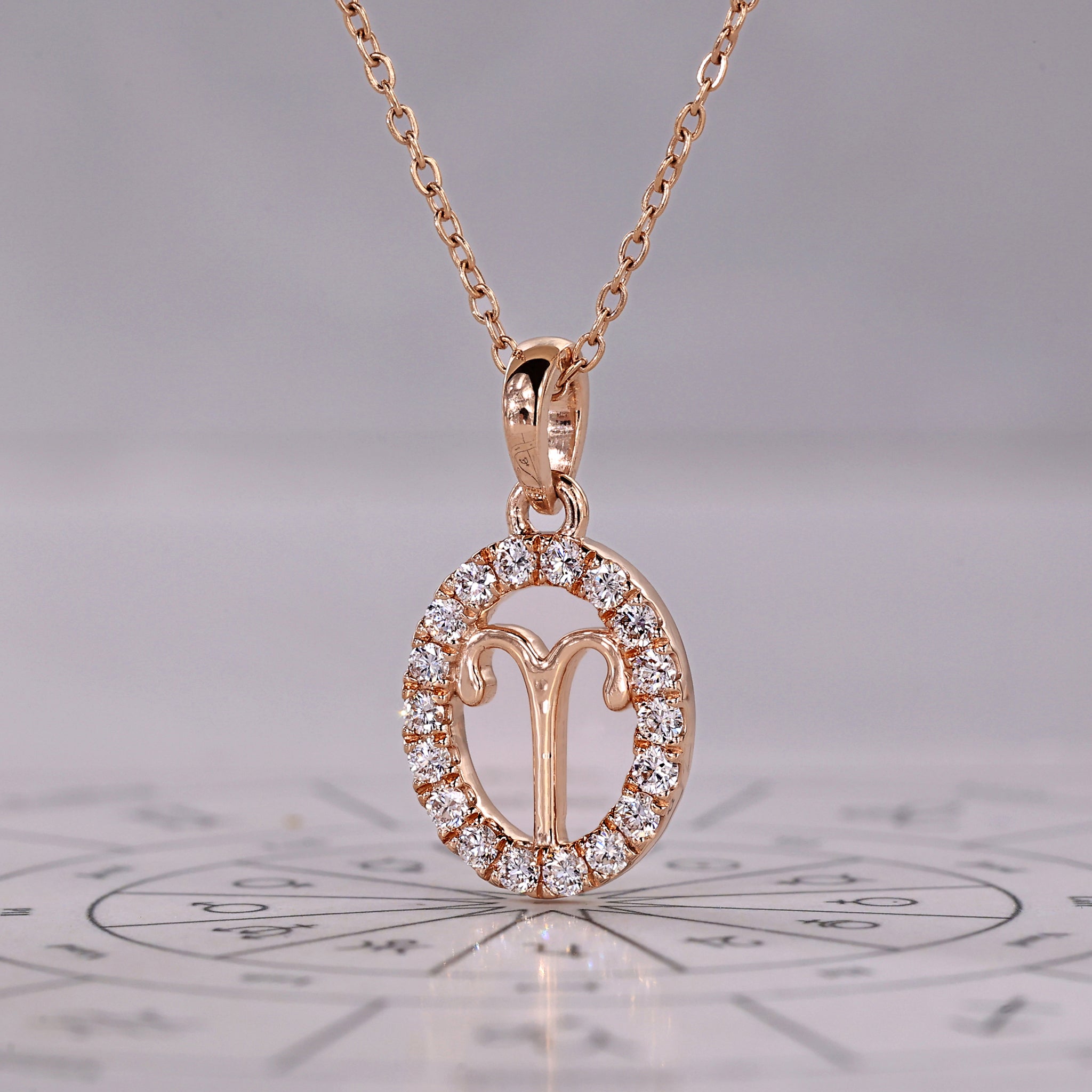 Rose Gold Aries Pendant In Halo Design