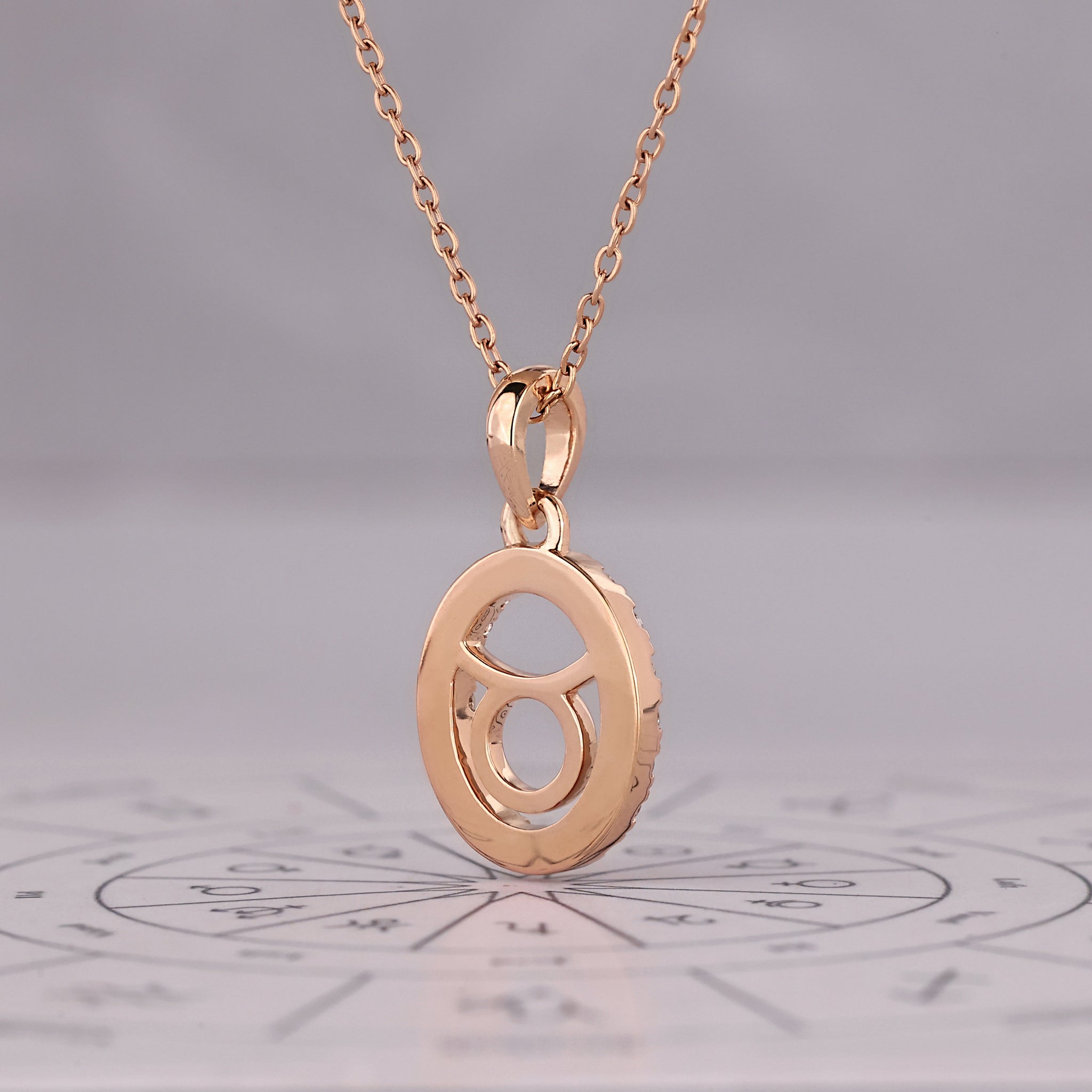 Halo Style Taurus Pendant In Rose Gold