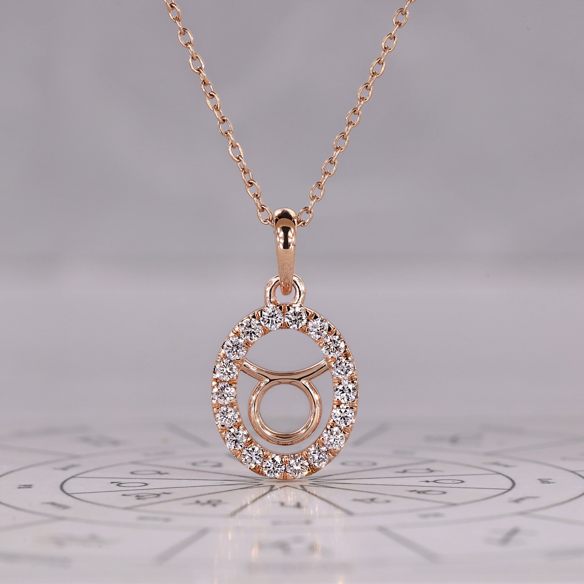 Halo Style Taurus Pendant In Rose Gold