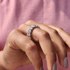 Emerald Wedding Band In A Shared Prong Design