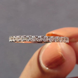 White Gold Eternity Band With Round Moissanite
