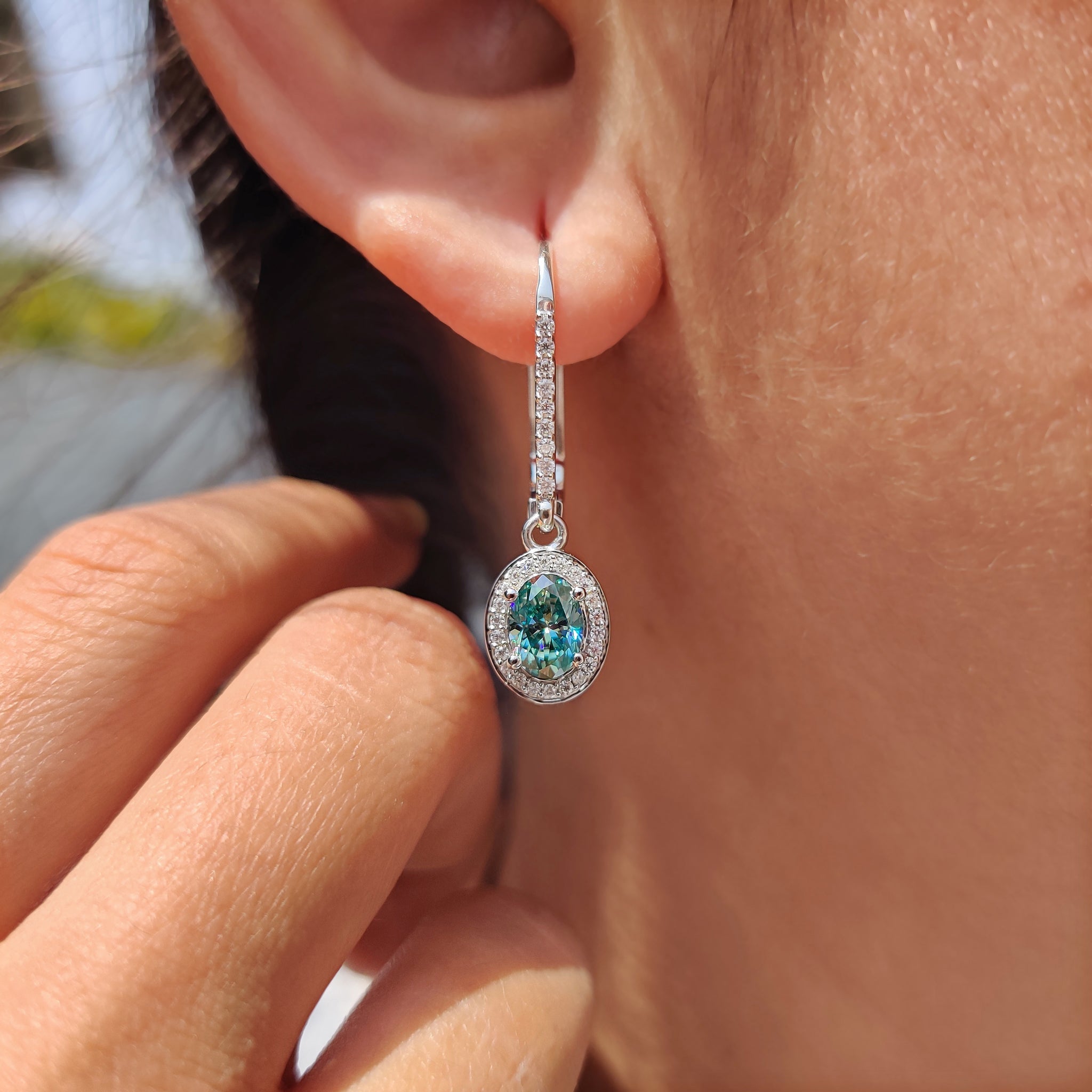 Oval Cut Earrings In Halo Style