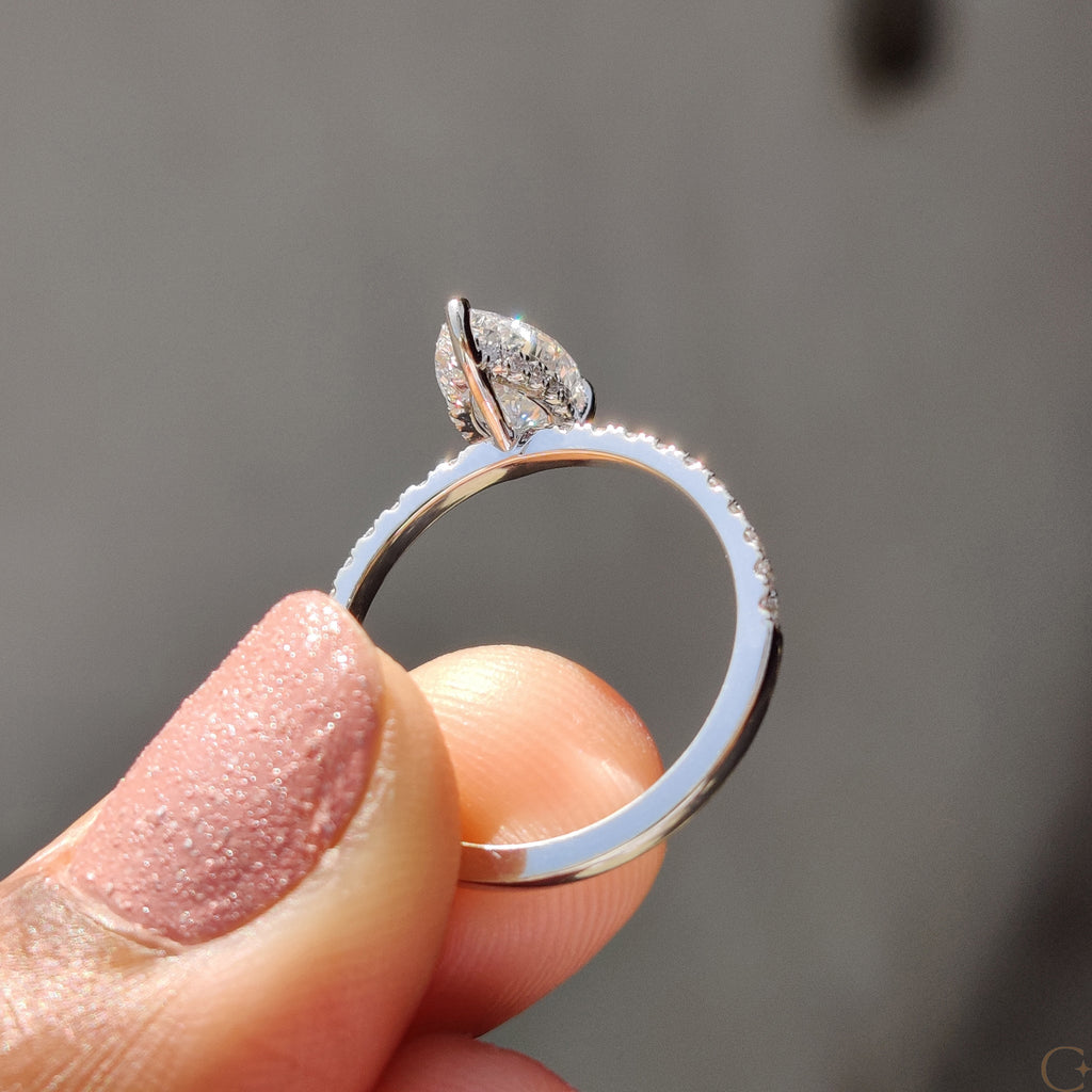 Pear Cut Engagement Ring With Hidden Halo Design